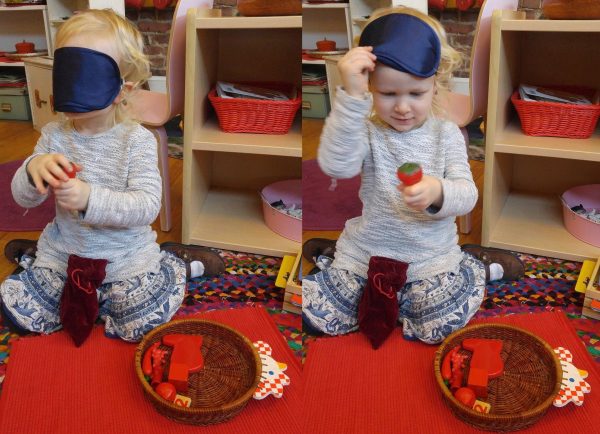 Montessori toddlers working with sensorial materials